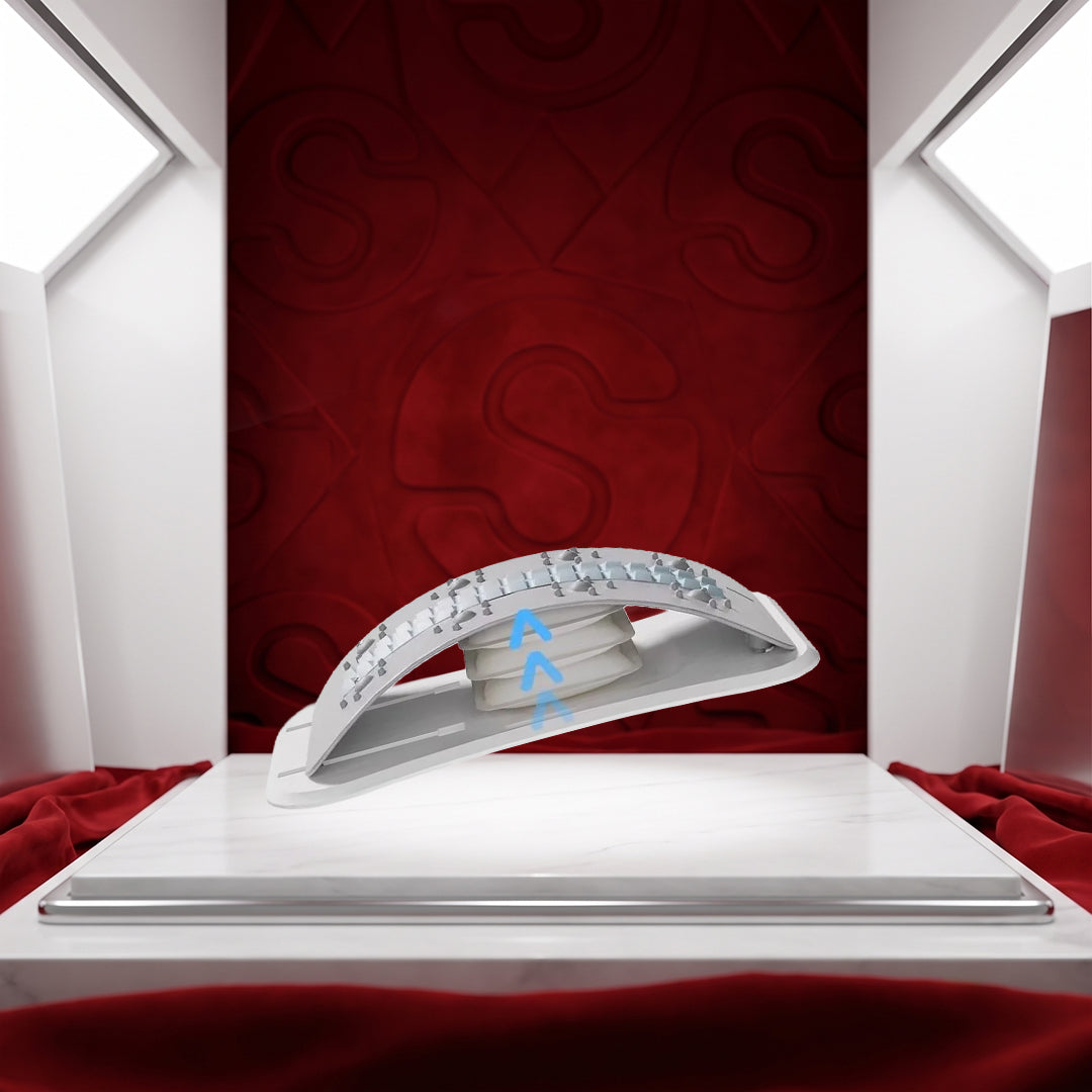 White arched back plate with a raised centre and small nubs on the surface