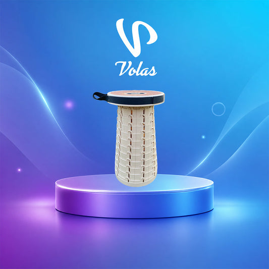 Cream telescopic folding stool with a black carry strap