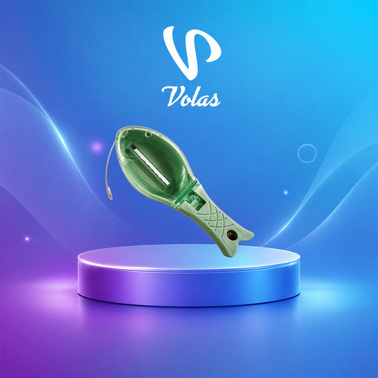 Green fish-shaped scraper with a metal blade in a slot on the body